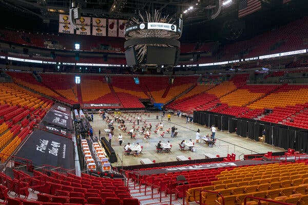 A vaccination event at AmericanAirlines Arena in Miami. Once Florida began giving coronavirus vaccines, Ms. Centner held a virtual talk with an anti-vaccination pediatrician.